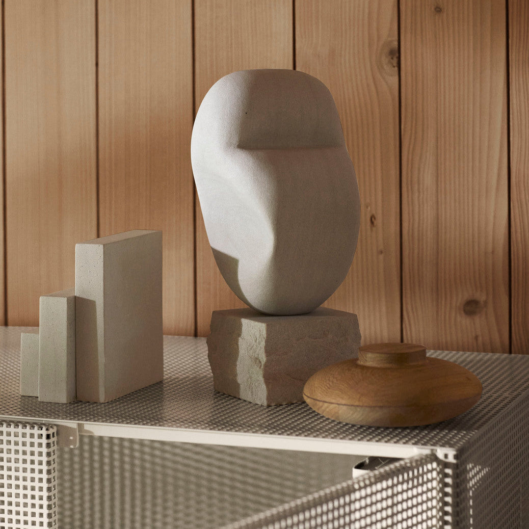 Sculpture serre-livres en grès et marbre